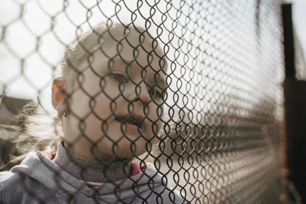 Little Girl Sad Look Metal Fence Social Problem Refugees Forced — Stock Fotó