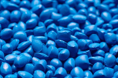 Granüllerde mavi polimer boya, arkaplan dokusu.