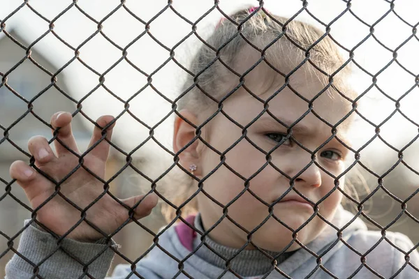 Little Girl Sad Look Metal Fence Problem Forced Deportation Ukrainian — Stock Fotó