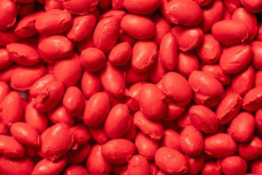 Granüllerde kırmızı polimer boya, arkaplan dokusu.