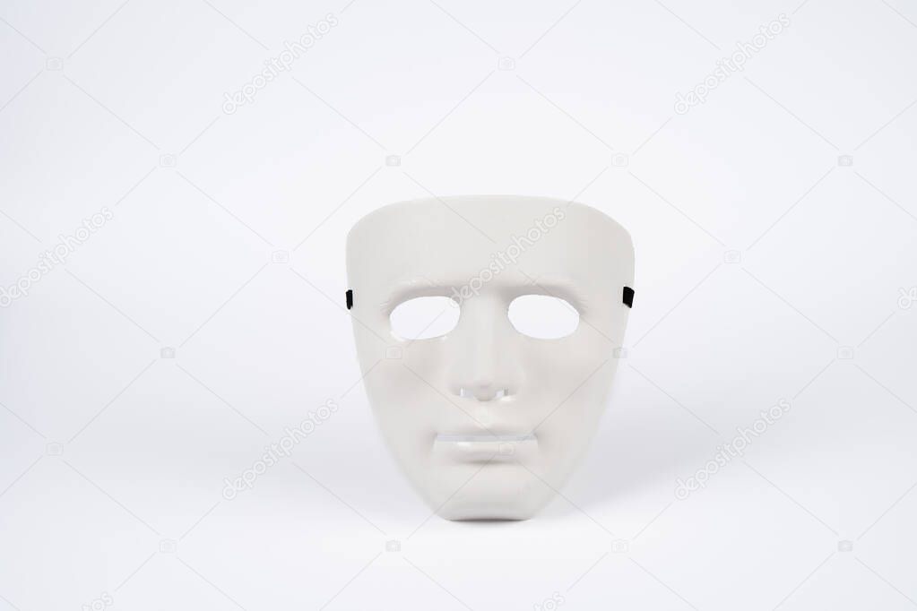 Paris, France - 11 22 2021: Packshot of Masked woman. A white undefined mask