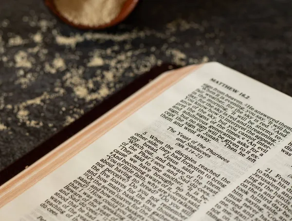 Yeast Spilled Table Open Holy Bible Book God Jesus Christ — Stock Photo, Image