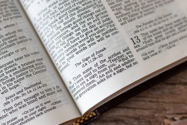 Sign Jonah Prophet Verses Open Holy Bible Book Wooden Table — Stock Photo, Image