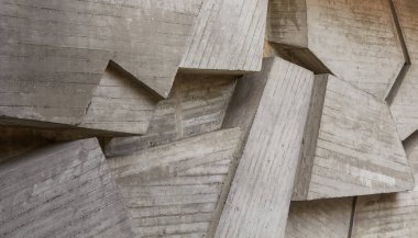Geometrically abstract cement background. Background or texture with concrete geometric pattern.