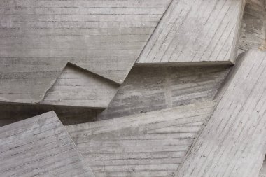 Geometrically abstract cement background. Background or texture with concrete geometric pattern.