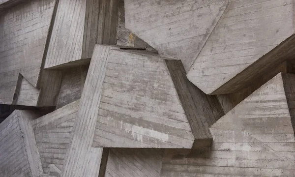 Geometrically abstract cement background. Background or texture with concrete geometric pattern.