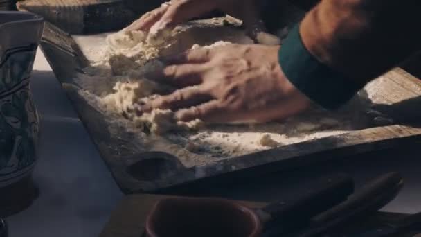 Hands mixing flour and water together to prepare the dough — Vídeo de Stock