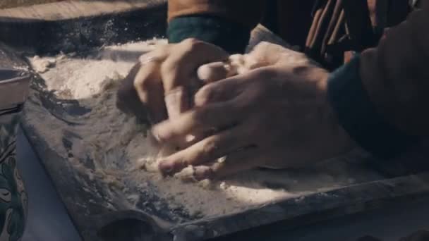 Hands knitting a ball of dough to cook bread — Vídeo de Stock