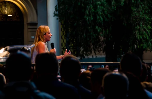 Cagliari, Sardinia, Italy: SEP 22 2022: Giorgia Meloni Fratelli D'Italia on the stage of the rally in cagliari discuss about new elections Piazza del Carmine, Cagliari