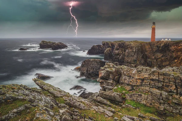 Lighthouse during storm weather with lightening, Butt of Lewis,Outer Hebrides, Scotland — Stockfoto