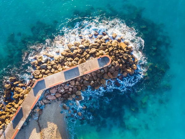 Top down aerial view of breakwater and sea in Liguria Sea, Italy — 图库照片