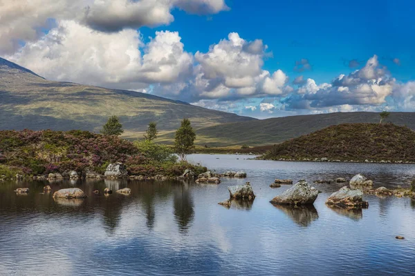 The lakes of Lochan na h-Achlaise on the vast peat bogs of Rannoch Moor in the remote West Highlands of Scotland. — Stock Photo, Image