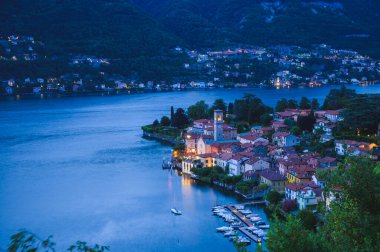 Panoramic top view of Lake Como during evening. Lombardy, Italy. The small town of Torno. 