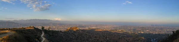 Panoramic view of the city Los Angeles surrounded by the mountains.