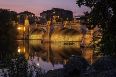 Beautiful night view of the bridge over the river Po in the city of Turin, Italy.