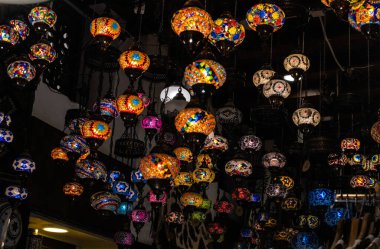 Set of typical Moroccan glass mosaic lanterns with selective focus.
