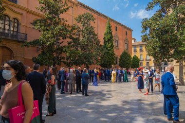 GRANADA, SPAIN - SEPTEMBER 25, 2021: People celebrating wedding in Granada Cathedral.