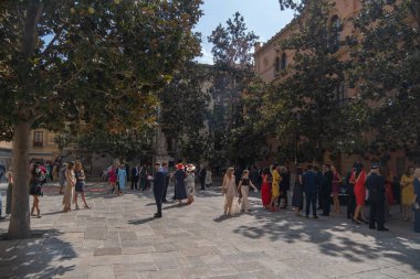 GRANADA, SPAIN - SEPTEMBER 25, 2021: People celebrating wedding in Granada Cathedral.