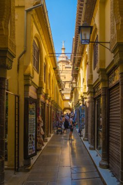 GRANADA, SPAIN - SEPTEMBER 25, 2021: Tourists at the old Alcaiceria arab market.