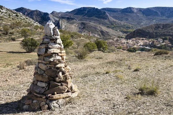 Stone pile, rock cairn, built to serve as a direction for tourists climbing the mountains, Molinos, Maestrazgo, Teruel, Aragon, Spain
