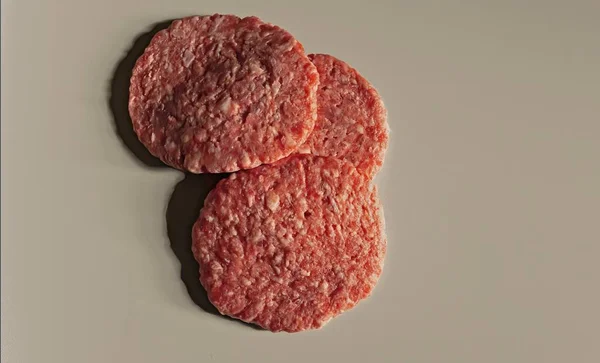 Ultra-processed food, three very fatty meat burgers