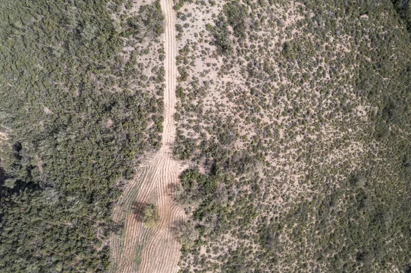 Aerial Photo Plowed Road Mountains Trees Bushes — Fotografia de Stock