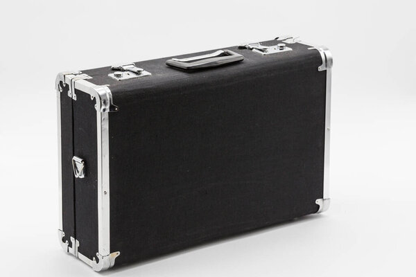 Black retro briefcase, standing on a white background