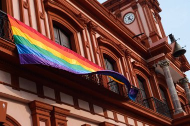 Colima, Colima. Mexico; july 03, 2022: Government Palace in Colima adorned with a multicolored flag.