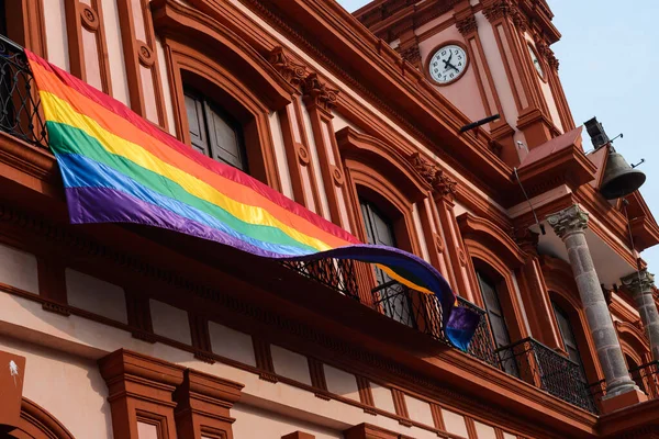 Colima, Colima. Mexico; july 03, 2022: Government Palace in Colima adorned with a multicolored flag.