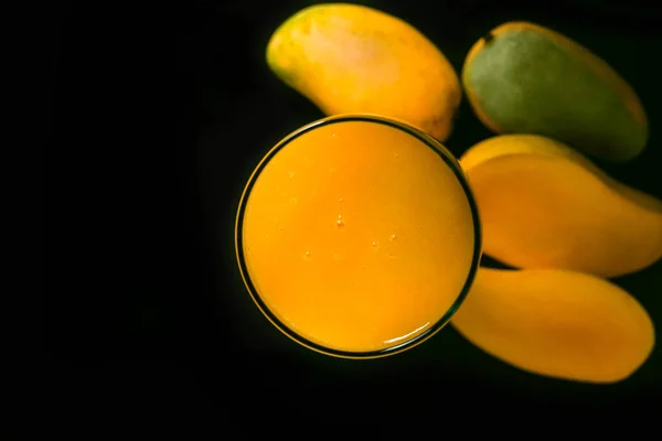 Mango Juice Glass Group Mangoes Black Glass Table Blue Background — 스톡 사진