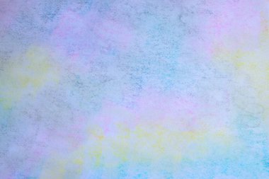 Textured paper painted with different colored chalk. Multicolor background.