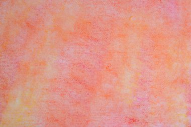Textured paper painted with orange chalk. Background.
