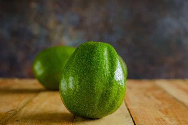 Avocados Wooden Table Isolated Avocados Foreground —  Fotos de Stock