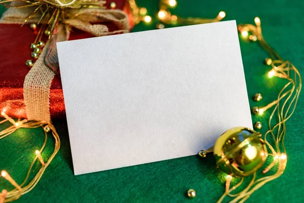 Blank card with Christmas decorations. Christmas card mockup.