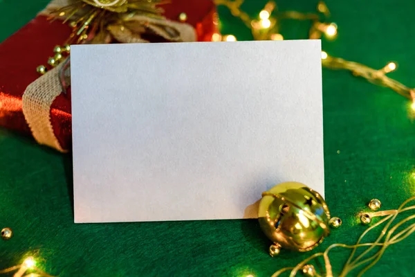 Blank card with Christmas decorations. Christmas card mockup.