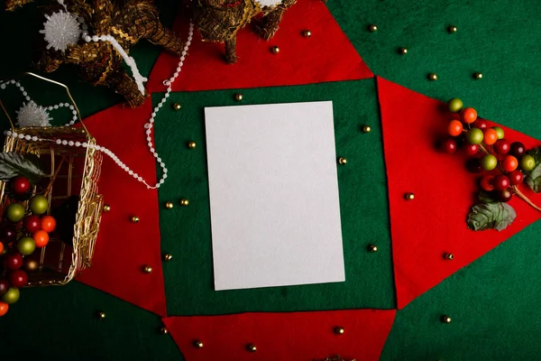 Blank card with Christmas decorations. Christmas card mockup.