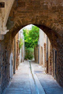 Exterior view of the Passage Jules-Romains, an old Renaissance period covered alley located in the old medieval town of Hyeres, France