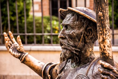 Close-up of the face of the statue of Don Quixote by Cervantes in front of the house of Alcala de Henares