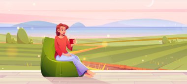 Kadın tarlalara bakan terasta dinleniyor.