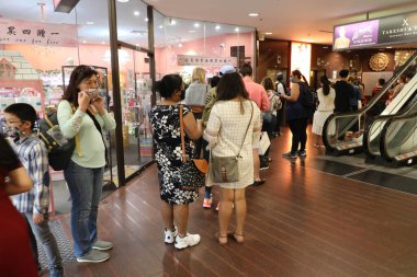 683 George Caddesi, Sydney 'deki Marigold Restoranı için kuyruk var..