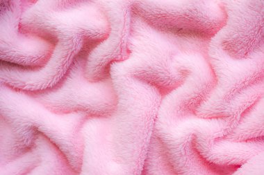 Pembe havlu arka planı. Yumuşak bir kumaş dalgası. Yeni modern tasarım lüks ışık ve yumuşak dalga pürüzsüz ipek duvar kağıdı. Boş yer. Kart posteri veya sunum ürünleri kavramı için.