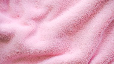 Pembe havlu arka planı. Yumuşak bir kumaş dalgası. Yeni modern tasarım lüks ışık ve yumuşak dalga pürüzsüz ipek duvar kağıdı. Boş yer. Kart posteri veya sunum ürünleri kavramı için.