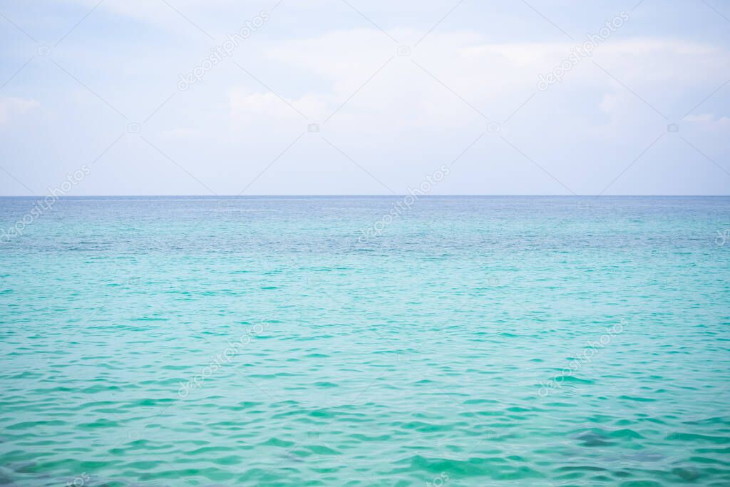 Blue Sea with White Cloud Sky Day Light Horizon view Background. Texture Surface Still Calm Peaceful of Water Ocean. Clean Clear Landscape. Tropical Travel Summer Holidays, Environment  Concept.