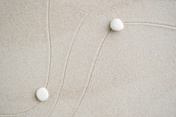 Japanese Zen Garden with Pebble with Line on Sand.mini Stone on Beach backgrond Top View and nobody.Ciircle Rock Balance Japan on nature.Simplicity Purity life.Relax Aromatherapy Spa and Yoga.Buddhism