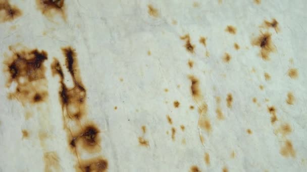 Фон в виде жареного пита хлеба прядение, текстура свежих хлебобулочных изделий — стоковое видео