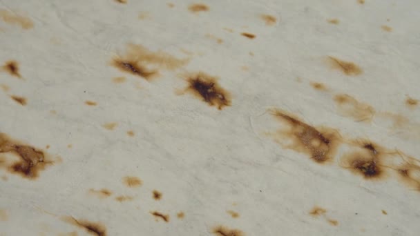 Fundal sub formă de filare de pâine prăjită pita, textura produselor proaspete coapte — Videoclip de stoc