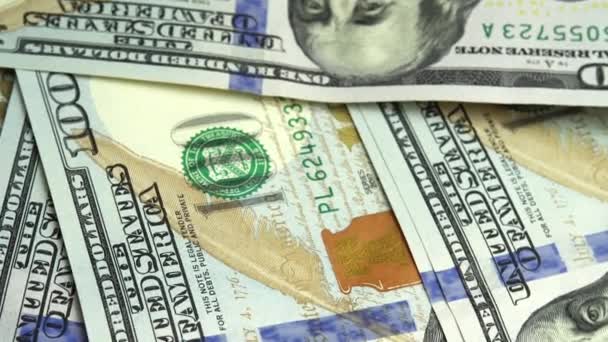 Az új 100 dolláros bankjegyek forgási háttere, új 100 dolláros bankjegy — Stock videók