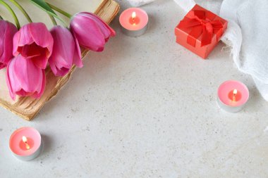 Beautiful pink tulip flowers background for Birthday, Mother's day, Valentine's Day, March 8, Wedding concept greeting card. Floral decorative frame. Festive background. Copy space for text