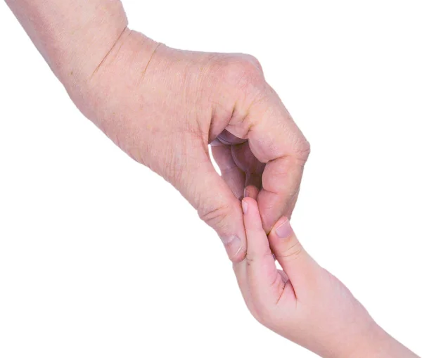 Bir çocuğun eli ve yaşlı bir insanın eli beyaz arka planda parmaklarıyla birbirine dokunur. İzole et.