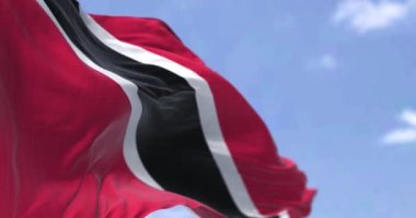 Trinidad ve Tobago bayrağının açık havada rüzgarda dalgalanmasının ayrıntıları. Trinidad ve Tobago Karayipler 'deki en güneydeki ada ülkesidir. Yavaş çekimde kusursuz döngü